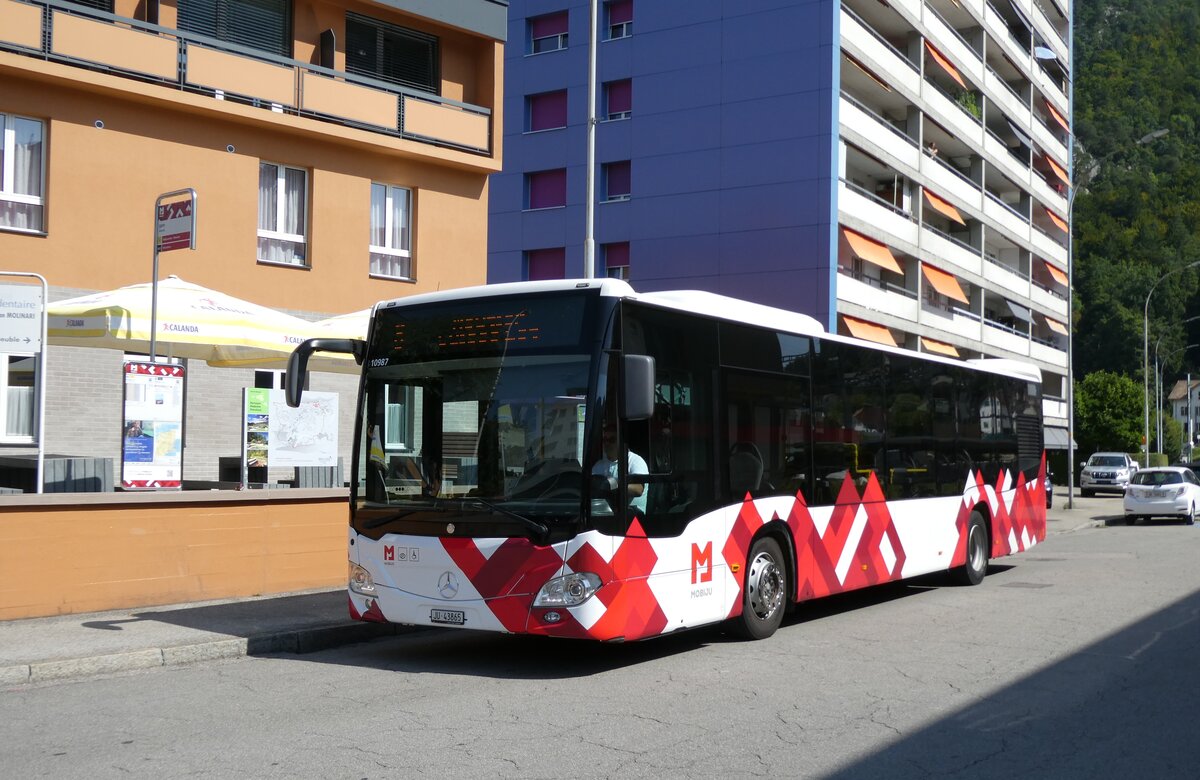 (278'717) - CarPostal Ouest - JU 43'865/PID 10'987 - Mercedes am 9. August 2025 beim Bahnhof Moutier