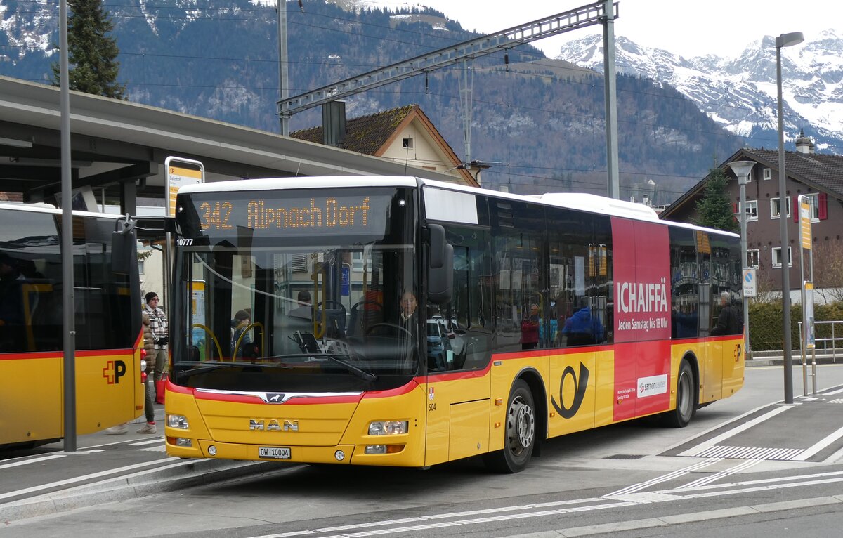 (283'275) - PostAuto Zentralschweiz - Nr. 504/OW 10'004/PID 10'777 - MAN (ex Nr. 10; ex Dillier, Sarnen Nr. 10) am 19. Dezember 2025 beim Bahnhof Sarnen