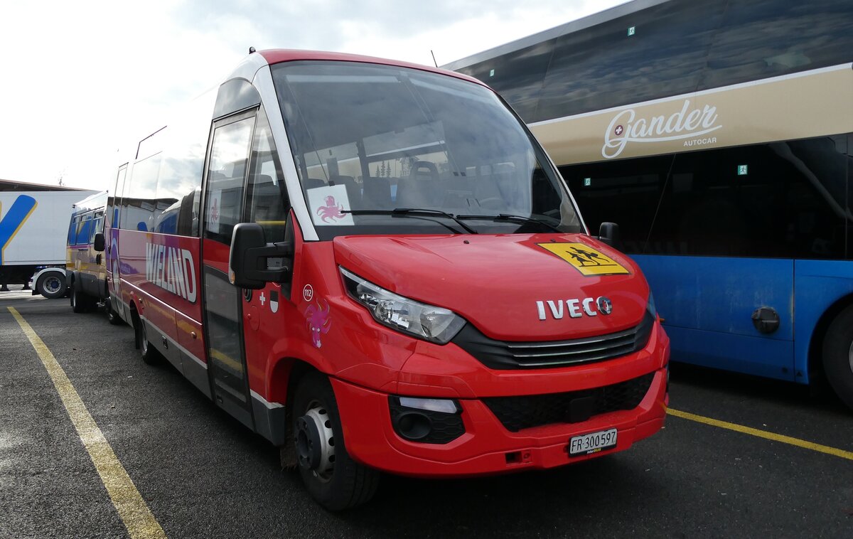 (283'335) - Wieland, Murten - Nr. 112/FR 300'597 - eIveco am 20. Dezember 2025 in Kerzers, Interbus