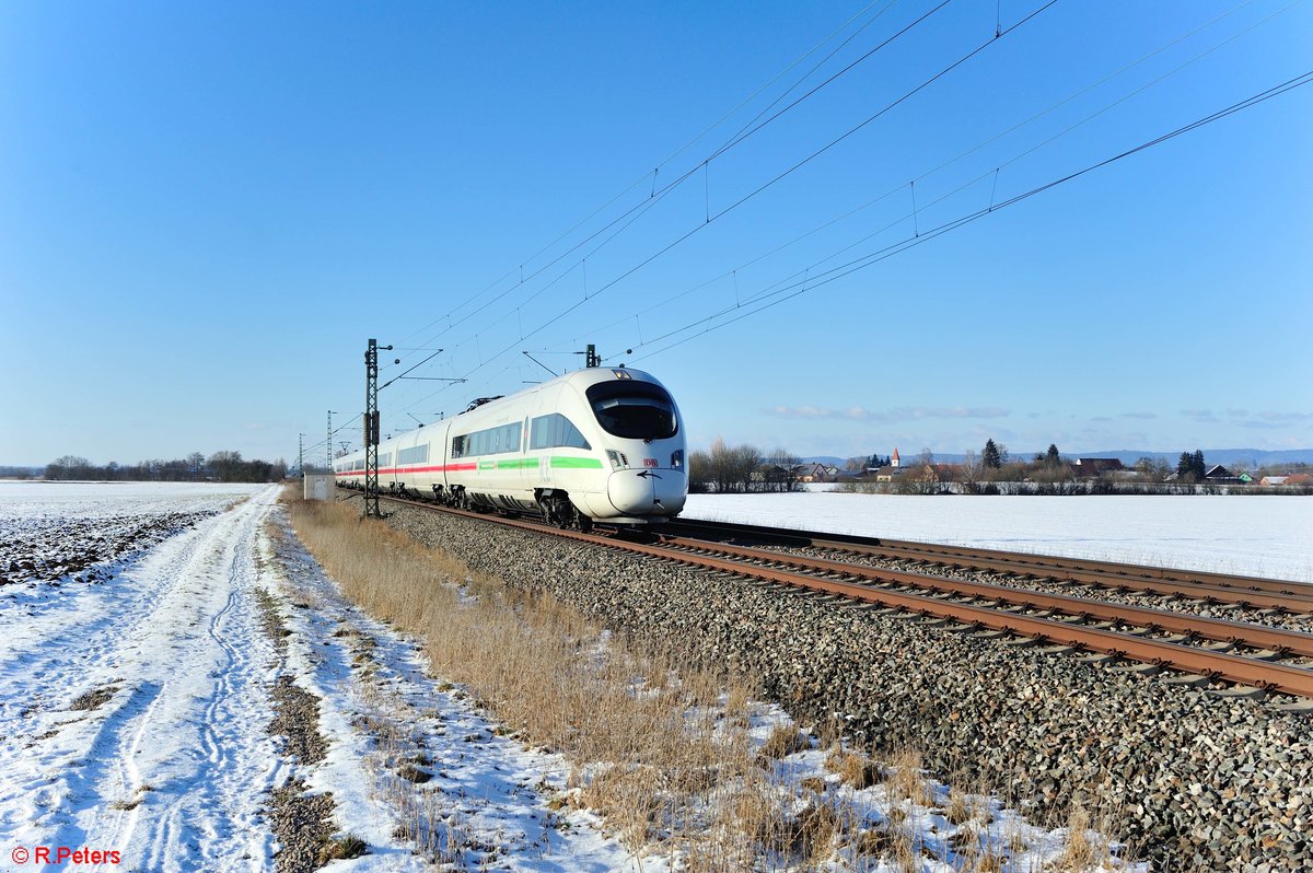 411 062-5  Valingen an der Enz  als ICE 27 Dortmund - Wien kurz vor Moosham. 13.02.21