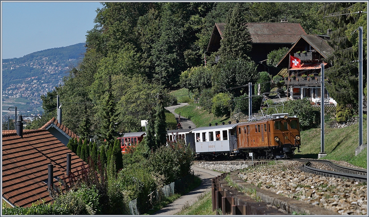50 Jahre Blonay Chamby - MEGA BERNINA FESTIVAL: Die Bernina Bahn Ge 4/4 81 erklimmt mit dem  Riviera-Belle-Epoque Zug von Montreux nach Chaulin die Steigung zwischen Chernex und Sonzier. 

n 8. Sept. 2018