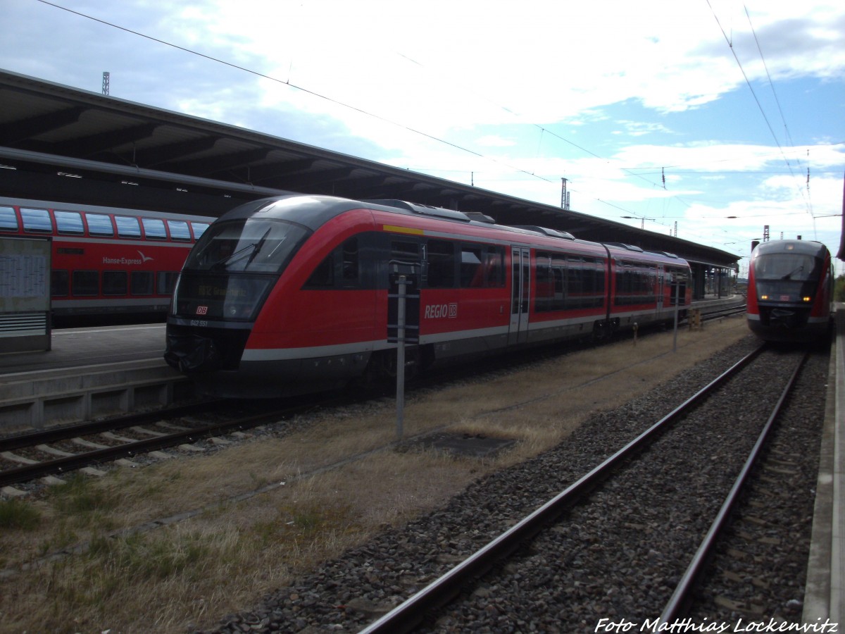 642 551 / 051 als RB13 mit ziel Graal-M�ritz & 642 553 / 053 als RE8 mit ziel Wismar im Bahnhof Rostock Hbf am 13.7.14
