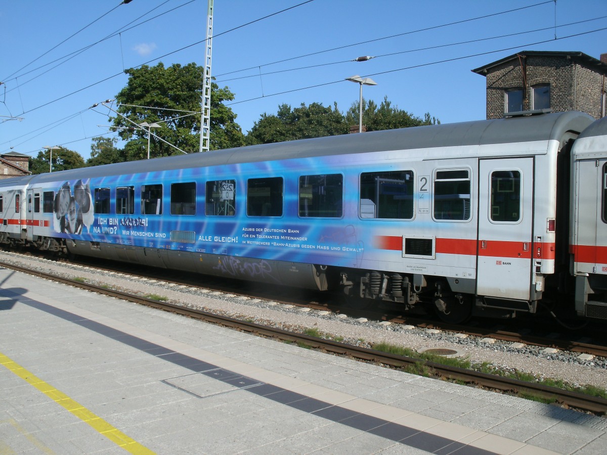 Auch ihn gibt es noch den Werbewagen Bvmsz 61 80 21-94 606-5 der,am 26.August 2013,in Bergen/Rgen hielt.