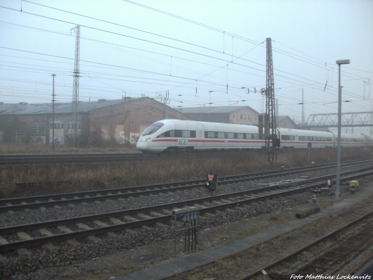BR 411 als ICE 1609 mit ziel M�nchen Hbf beim Verlassen des Bahnhofs Stralsund Hbf am 6.3.14