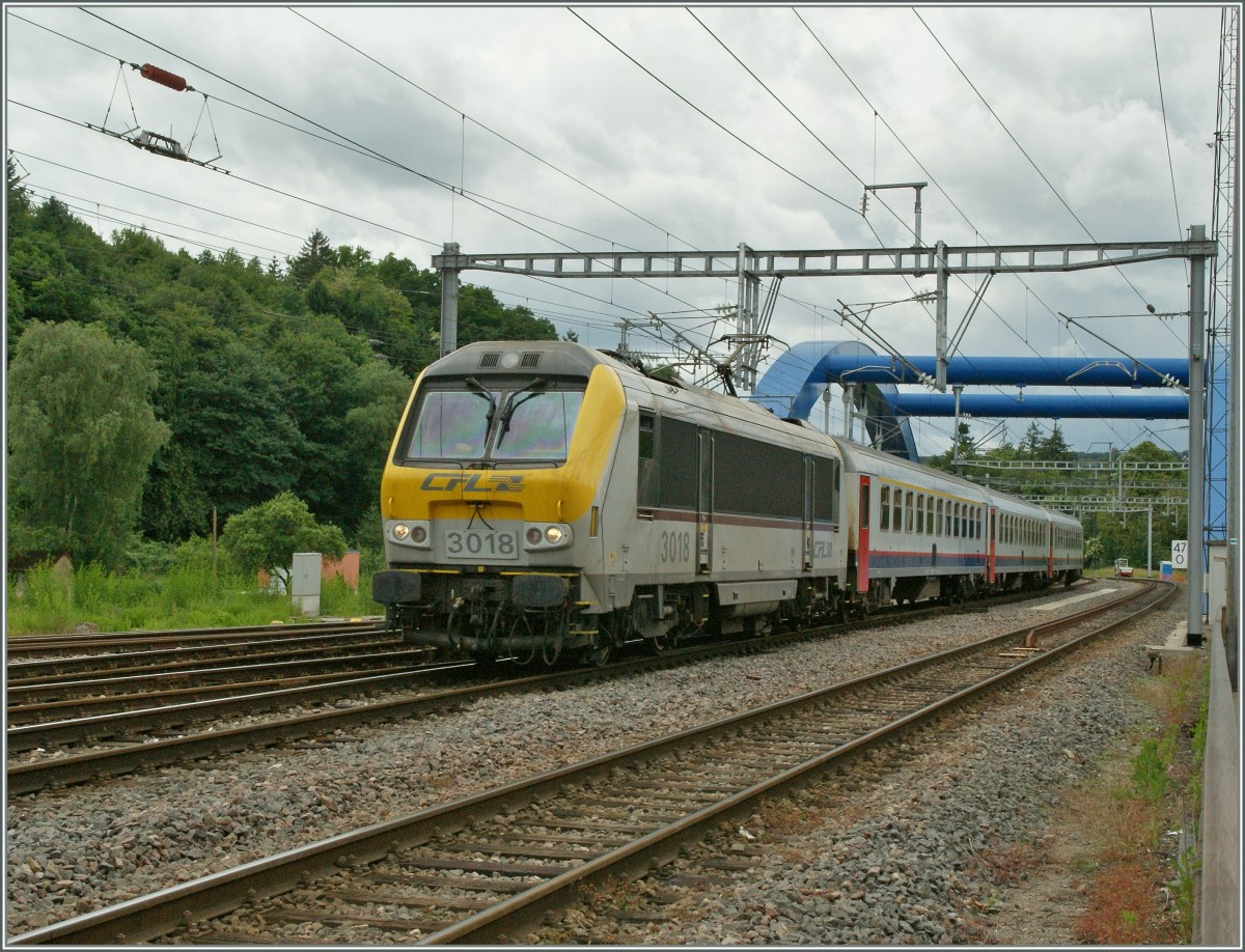 CFL 3018 mit einen IR nach Liers in Ettelbruck. 
15. Juni 2013