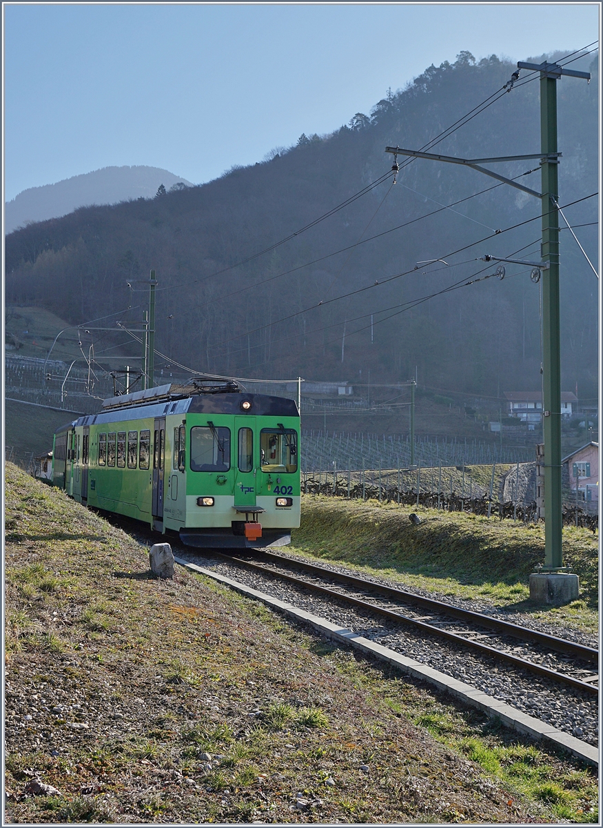 Der ASD BDe 4/4 402 auf der Fahrt nach Aigle in den Weinbergen oberhalb des Ortes.

23. Feb. 2019