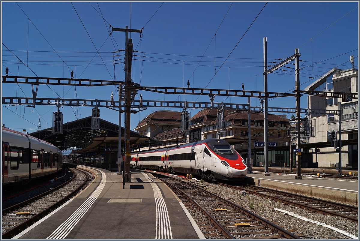 Der SBB ETR 610 006 als EC 39 nach Milano bei der Abfahrt in Lausanne. 

27. Juli 2020