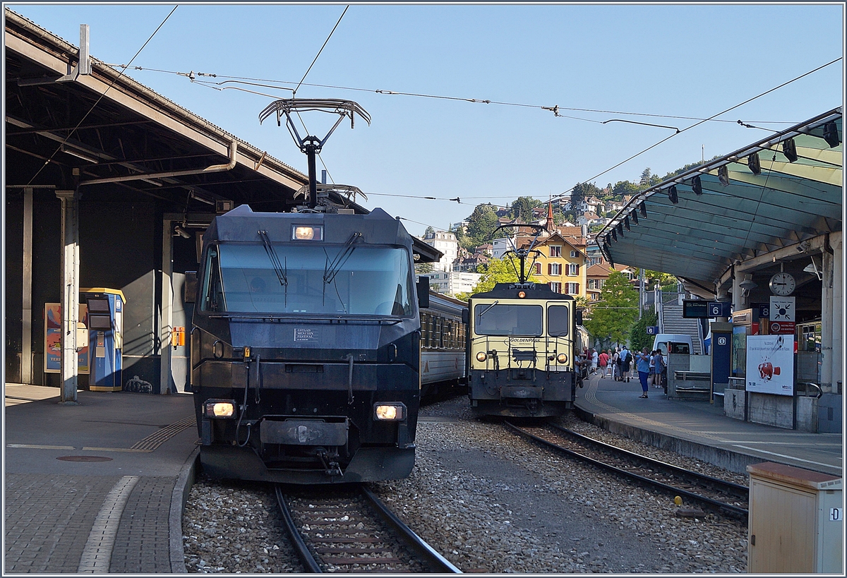Die MOB Ge 4/4 8003 und die GDe 4/4 warten in Montreux auf die Abfahrt.
21. Juni 2018