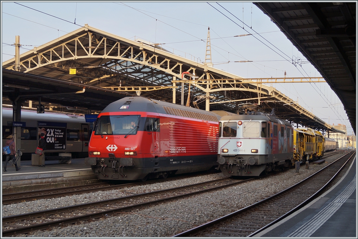 Die SBB Re 4/4 II 11344 (Re 420 344-4) und Re 460 027 in Lausanne.

17. April 2021