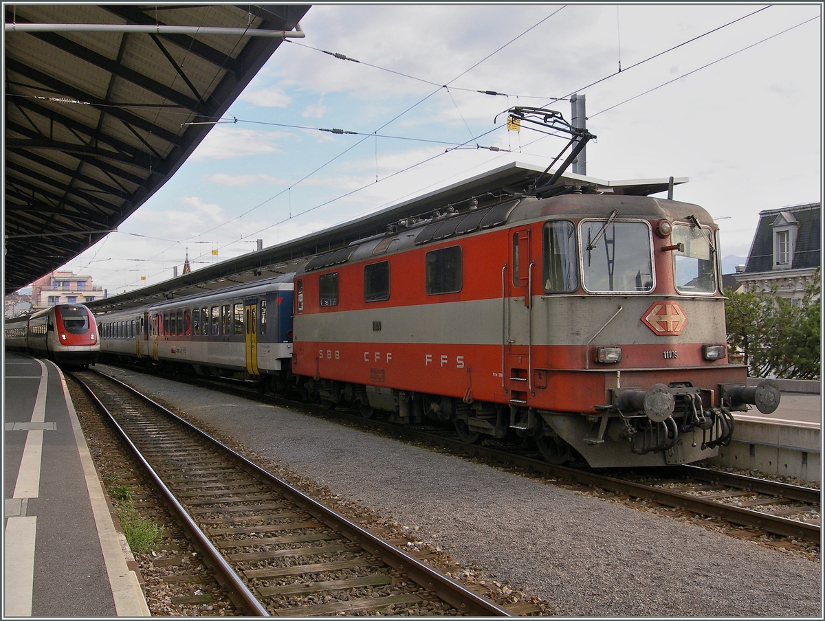 Die SBB Swiss-Express Re 4/4 II 11109 in Lausanne. 
16. Nov. 2006