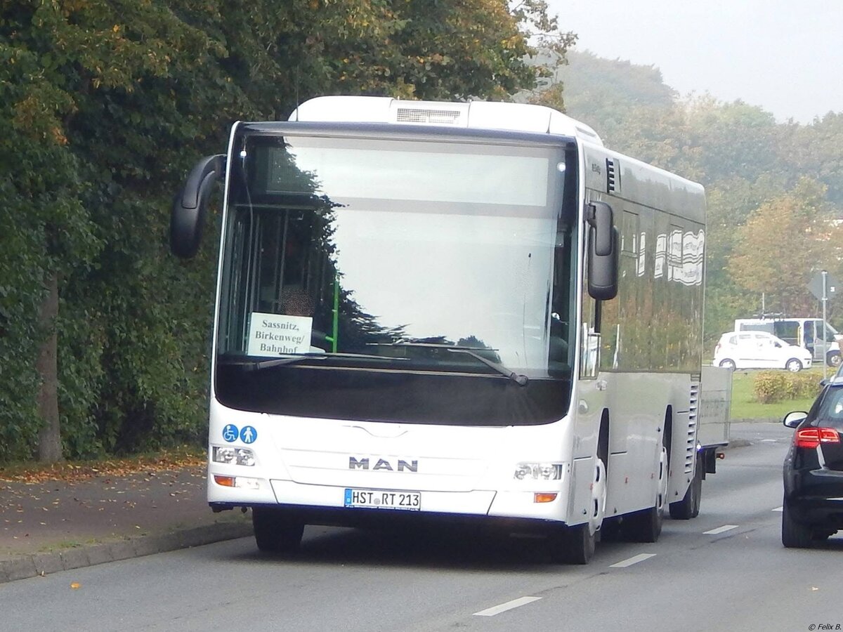MAN Lion's City LE Ü vom Reiseienst Teske aus Deutschland mit Anhänger in Sassnitz.