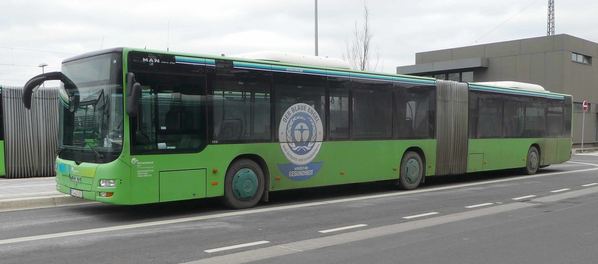 MAN Lion`s City von RhnEnergie steht am Bahnhof in Hnfeld, 12-2018