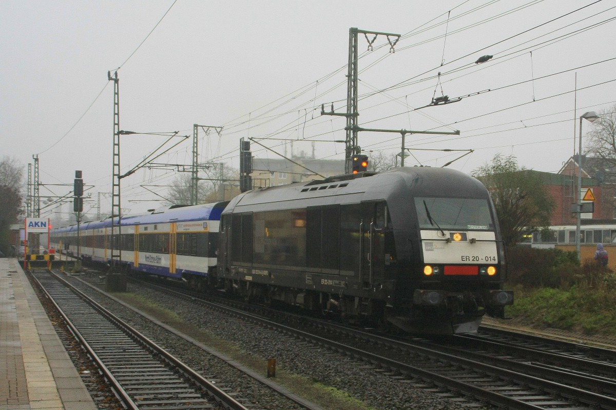 MRCE ER20-014 mit NOB nach Westerland bei der Ausfahrt aus Elmshorn am 18.12.2014