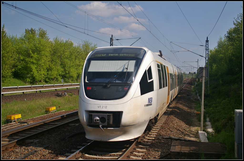 NEB VT 2.12 / 643 360-0 fuhr als RB12 Berlin Ostkreuz am 11.05.2017 nach dem planmäßigen Halt in Berlin-Hohenschönhausen aus dem Bahnhof ab.