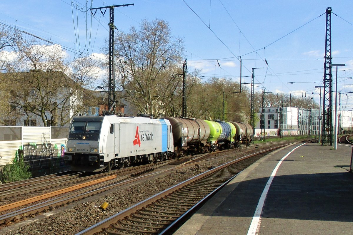 ReTrack 185 676 schlept am 20 Jnner 2017 ein Kesselwagenzug durch Kln Sd. 