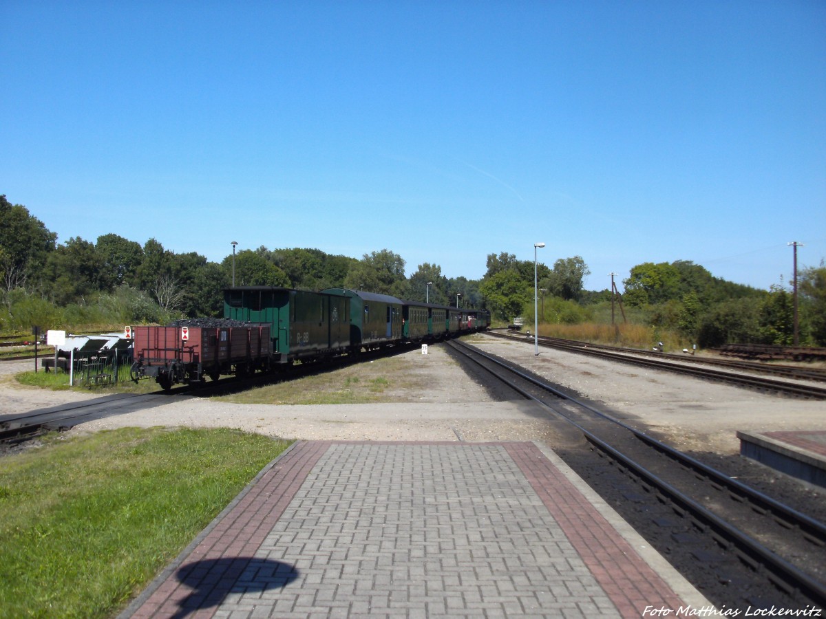 R�BB 99 4011 bei der ausfahrt aus Putbus nach G�hren udn hat als Letztes noch einen Vollbeladenen Kohlewagen im Schlepptau am 26.8.13