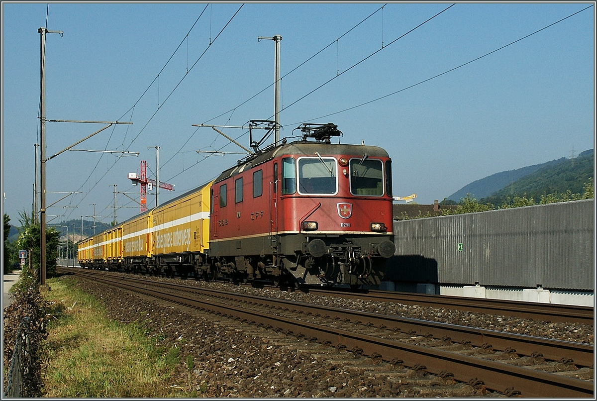 SBB Re 4/4 II mit einem Postzug zwischen Lengnau und Grenchen S�d.
22.07.2013