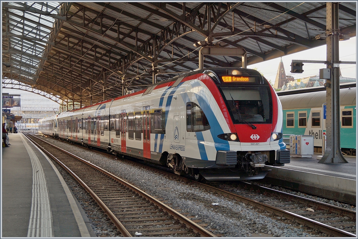 Zwei in Leaman Express Farben gestaltete SBB RABe 522 warten in Lausanne als S1 au die Abfahrt nach Grandson.
1. Juni 2018