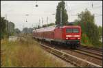 DB Regio 114 002-9 f�hrt mit dem RE3 am 12.09.2012 nach W�nsdorf-Waldstadt am S-Bahnhof Berlin-Karow vorbei