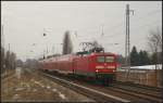 DB Regio 112 101 mit dem RE3 nach Elsterwerda am 12.02.2013 H�he Berlin-Karow