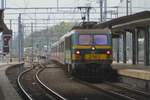 Am 5 Mai 2023 schiebt NMBS 2114 ein IC nach Oostende aus Gent Sint-Pieters.