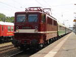 211 073-2 mit SDZ(Chemnitz-Warnemünde)bei der Durchfahrt in Rostock-Bramow.13.08.2022