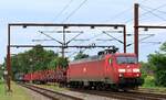 DBCSC EG 3101-9 REV/Cph/10.03.23 mit nem Modelbahnzug Einfahrt Pattburg/DK 22.05.2024