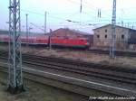 Einfahrt der BR 112 als RE5 aus Neustrelitz Hbf in den Bahnhof Stralsund Hbf / H�he Ehemaliges BW Stralsund (Lokschuppen 2+3) am 11.4.13