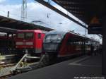 112 101 und 642 551/ 051 als RB12 mit ziel Graal-M�ritz im Bahnhof Rostock Hbf am 15.7.14