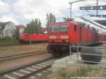 143 852-2 als S1 mit zeil Warnem�nde & 143 250 als S1 aus Warnem�nde im Bahnhof Rostock Hbf am 22.6.13