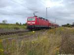 143 899-4 mit dem RE9 mit ziel Ostseebad Binz bei der Ausdfahrt aus Altef�hr am 7.8.13