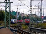 OLA VT 706 unterwegs nach Halberstadt, w�hrenddessen 143 XXX in den Bahnhof Halle (Saale) Hbf einf�hrt am 29.8.16