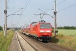 146 028 verl�sst mit dem RE30 mit ziel Halle/Saale Hbf den Bahnhof Z�beritz am 9.6.21