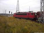 155 248-8 mit einem G�terzug beim Zwischenhalt im Bahnhof Stralsund R�gendamm am 18.11.13