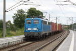 140 017 der PRESS mit einem Containerzug bei der durchfahrt in Z�beritz am 22.7.20