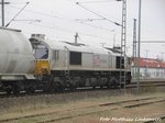 MEG 077 012-8 mit einen G�terzug beim zwischenhalt in Delitzsch am 13.4.16