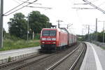 145 022 der MEG mit einem Autotransportzug bei der Durchfahrt in Z�beritz am 9.6.21
