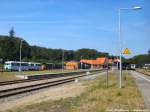 UBB GTW 2/6 mit ziel Swinem�nde Centrum (PL) und 771 007 mit 771 065 abgestellt im Bahnhof Seebad Heringsdorf am 25.7.14