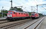 232 901-9 fuhr mit einen schotterzug durch golm bei potsdam,im hintergrund 1116 145 der �BB,13.07.21