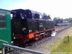 R�BB 99 4011 wartet auf die Weiterfahrt nach Lauterbach Mole im Bahnhof Putbus am 29.5.13