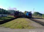 R�BB 99 4011 bei der Einfahrt in den Bahnhof Putbus w�hrend dessen 251 901 den Personenzug Durchlassen muss um sp�ter das Schlusslicht des Zuges zu bilden am 29.5.13