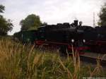 R�BB 99 4011 mit dem P108 bei der Einfahrt in Putbus am 30.8.13