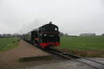 99 4632 mit ziel Ostseebad G�hren bei der Durchfahrt am Bedarfshaltepunkt Beuchow am 7.1.21