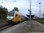ODEG ET 445.115 als RE2 mit ziel Cottbus und 928 658 als RE6 mit ziel L�beck Hbf  im Bahnhof Bad Kleinen am 13.7.14
