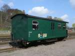 Gepckwagen mit dem RBB-Logo(Rgensche Bderbahn),am 05.Mai 2013,abgestellt in Putbus.