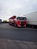 SZM DAF XF mit beladenem Tieflader der Spedition Wagenborg gesehen auf dem Autohof in Gr�nstadt am 11.02.2014