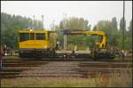 DB Netz BAMOWAG 54.22 in Berlin-Sch�neweide, 20.09.2014
<br><br>
Auch DB Netz war beim 11. Berliner Eisenbahnfest auf dem Vereinsgel�nde zu Gast. Das Gleisarbeitsfahrzeug hat ein Eigengewicht von 30 t, eine Nutzlast von 5 t und erreicht eine H�chstgeschwindigkeit (Hg) von 100 km/h  (Nummer 97 17 56 014 17-3).