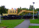 Der 15t-Schienendrehkran (BA 116  Wyhlen), DB 6808 Frankfurt / Glb Hanau (ex 	3080 974 0 092-0)  mit dem Kranschutzwagen (BA 815), DB 6913 Frankfurt (ex 978 0 021), am 02.10.2010 im Technik Museum Speyer.

Der Kran wurde 1957 von der Eisenbau Wyhlen AG unter der Fabriknummer 32004/1 gebaut. Das 5-achsige Fahrgestell wurde 1957 von der Georgsmarienhütte gebaut.
