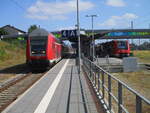 a-z/860370/re-rostock-hagenow-land-links-und-der RE Rostock-Hagenow Land links und der Anschluß RE nach Lübeck,am 31.August 2024,in Bad Kleinen.