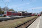 RE 18591 von Warnemnde nach Berlin Hbf(tief)hatte noch im Bahnhof Warnemnde Pause.03.05.2015